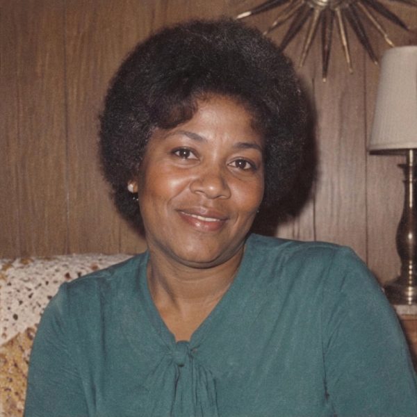 A woman in a green blouse, restored